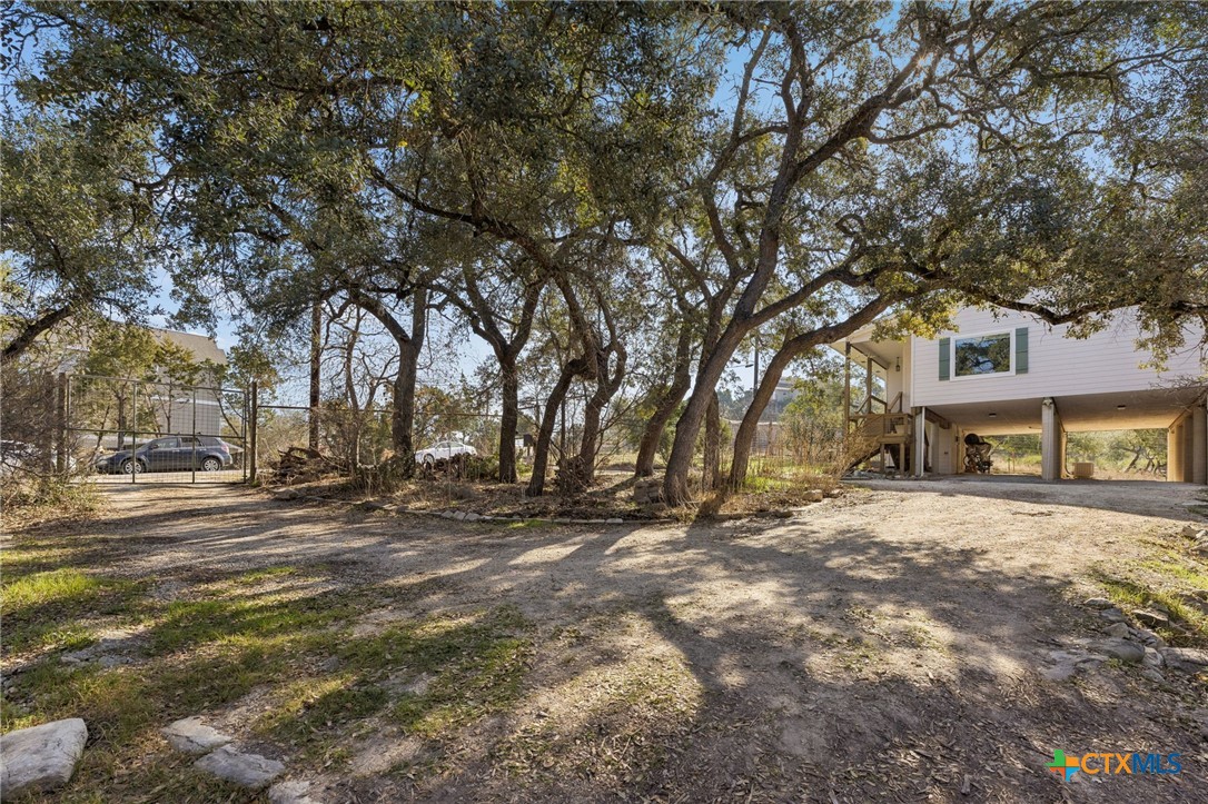 515 Valley Ridge Canyon Lake, TX 78133 - Photo 33 of 47 Woodland garden inside the U-shaped driveway.
