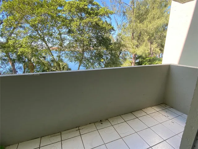 a view of backyard with green space