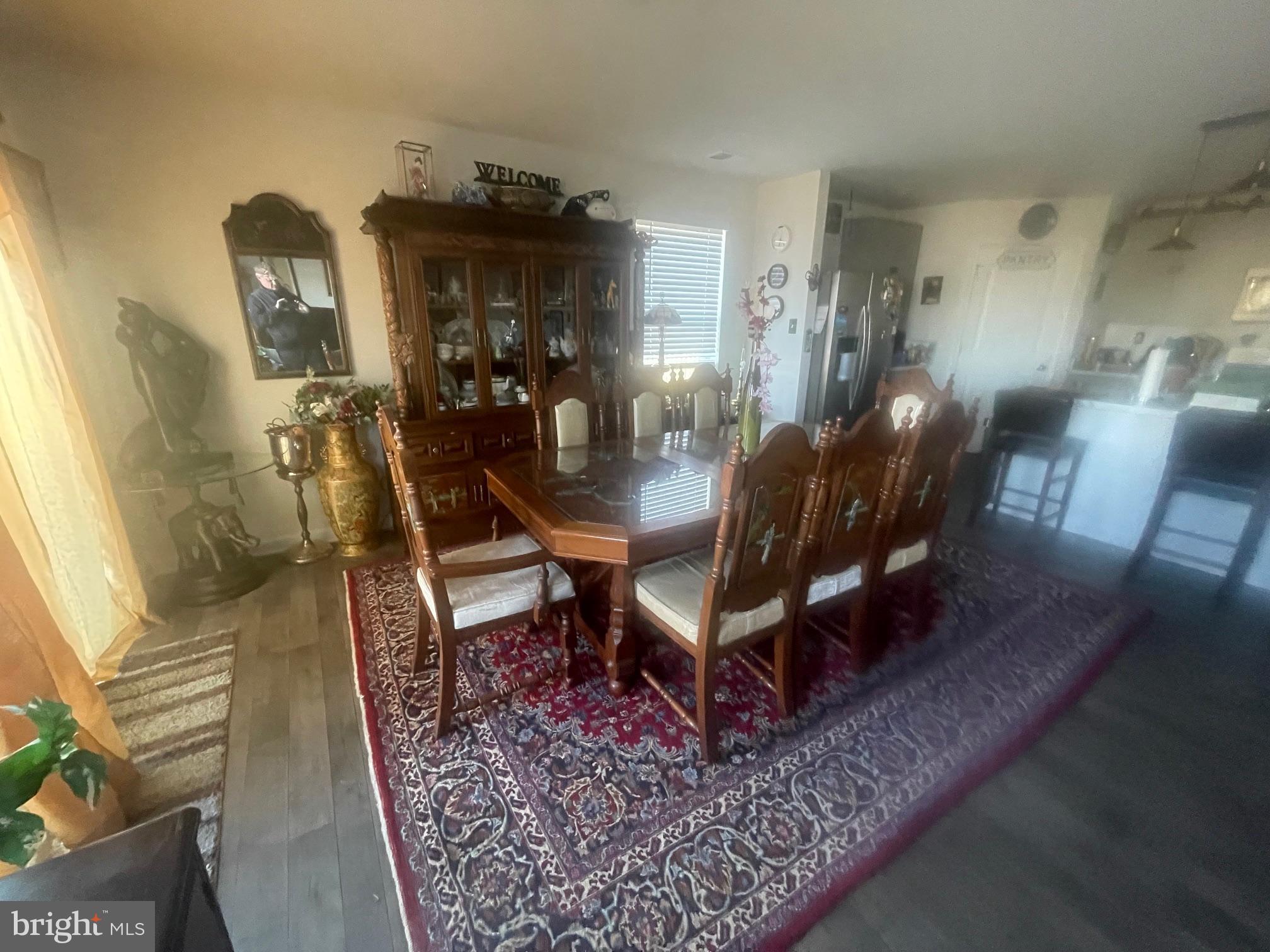 31715 Impetus Road Lewes, DE 19958 - Photo 11 of 12 a view of a dining room with furniture