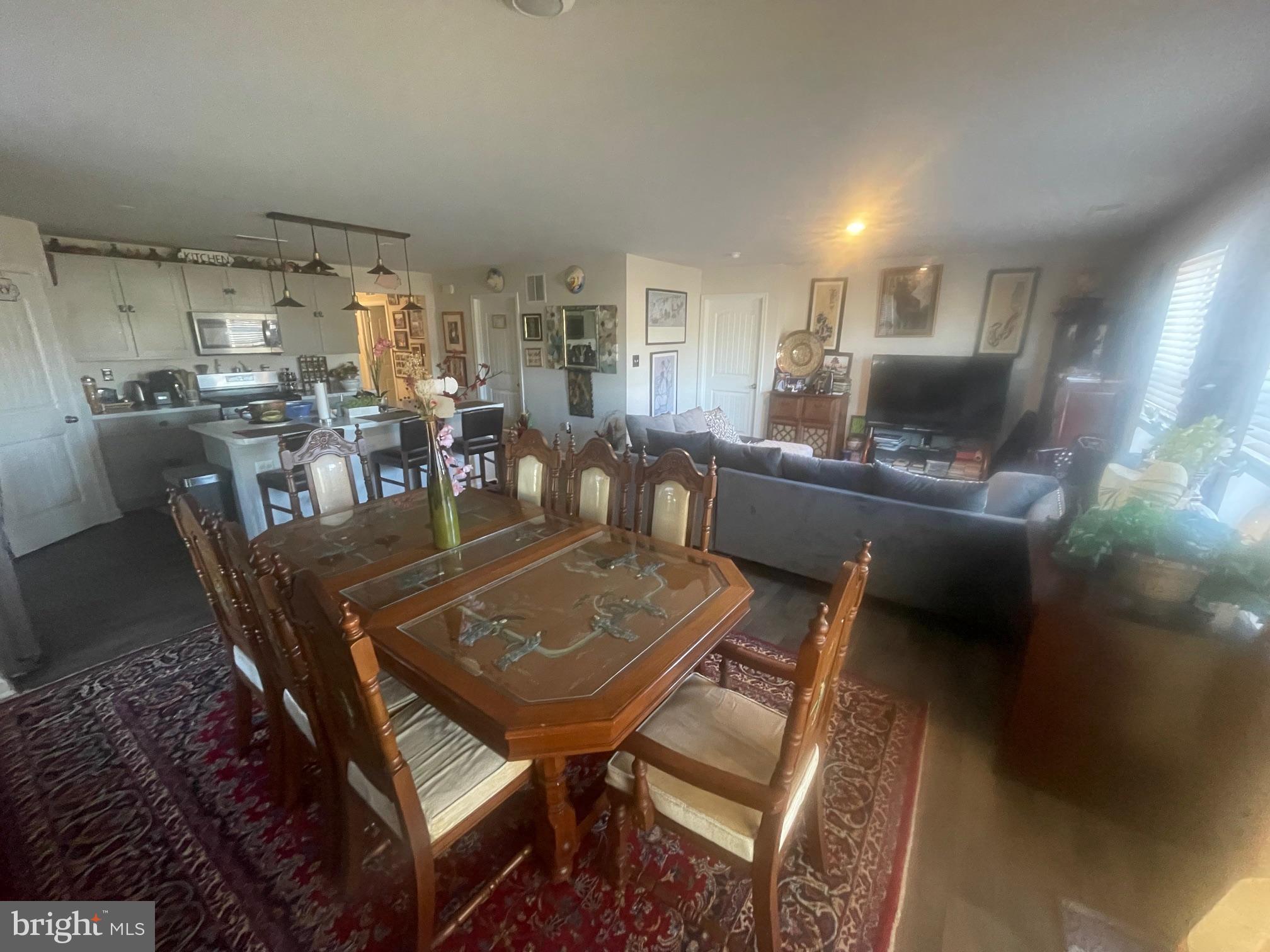 31715 Impetus Road Lewes, DE 19958 - Photo 3 of 12 a view of a dining room with furniture