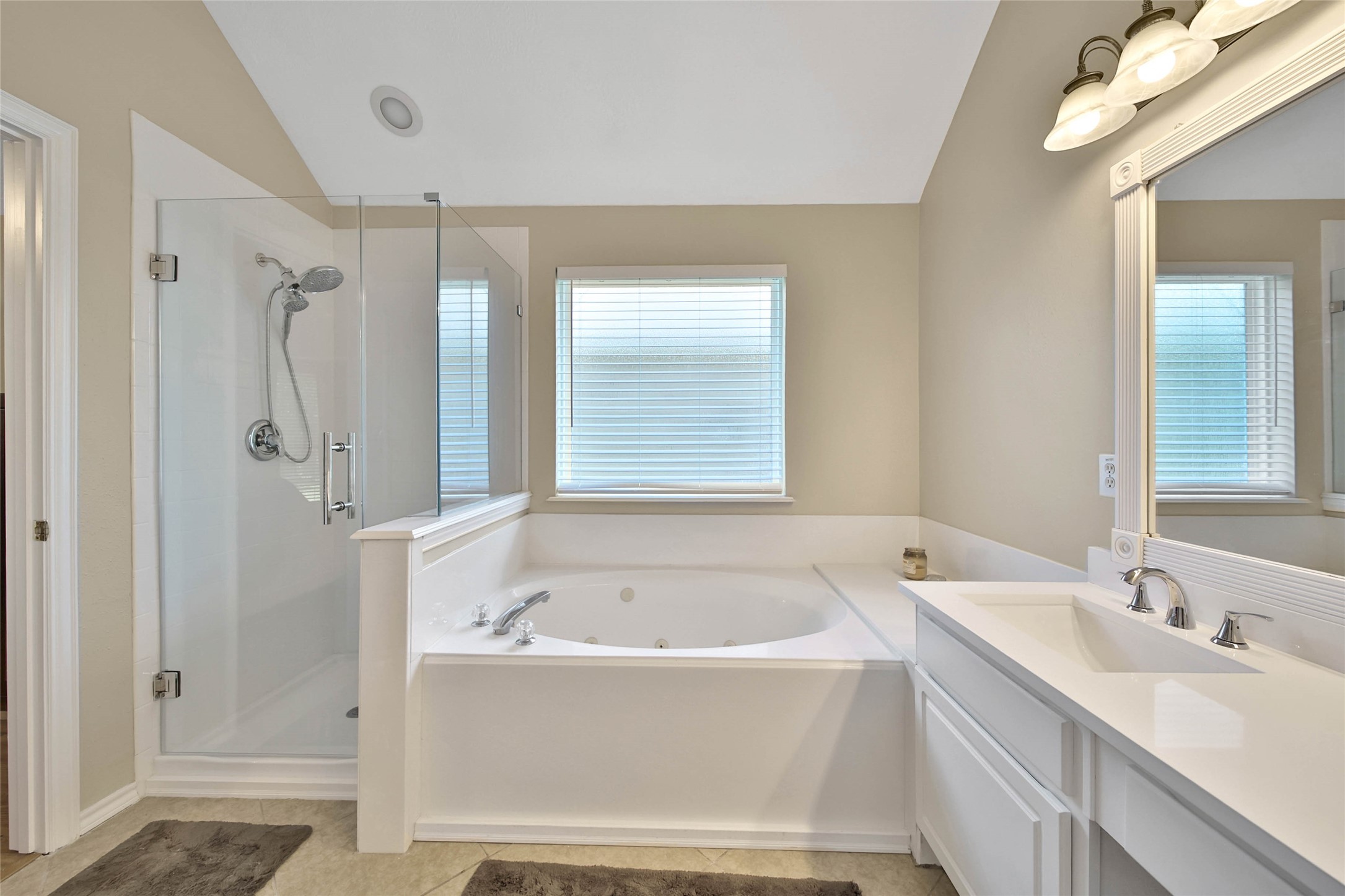 21338 Timber Pines Drive Spring, TX 77388 - Photo 21 of 29 a bathroom with a bathtub and a sink