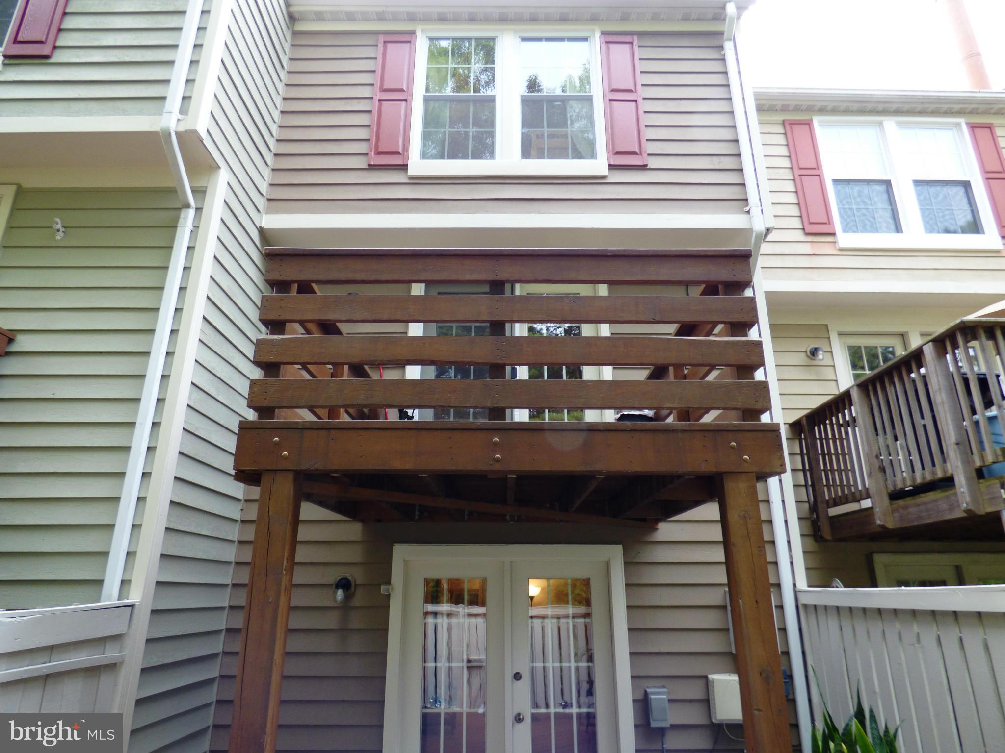 1634 Fieldthorn Drive Reston, VA 20194 - Photo 22 of 30 a front view of a house with a balcony