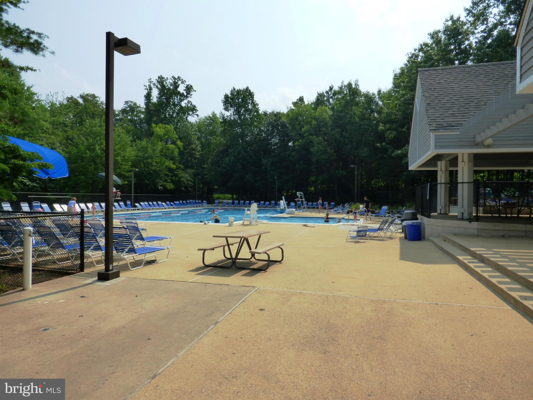 1634 Fieldthorn Drive Reston, VA 20194 - Photo 29 of 30 a view of a swimming pool with a patio