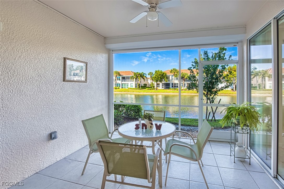 11611 Navarro Way, Unit 2002 Fort Myers, FL 33908 - Photo 2 of 45 a view of a dining room with furniture window and outside view