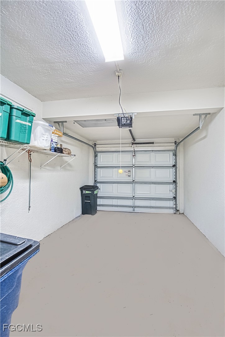 11611 Navarro Way, Unit 2002 Fort Myers, FL 33908 - Photo 34 of 45 a view of a room with storage and utility