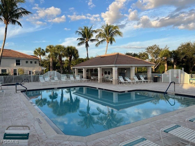 11611 Navarro Way, Unit 2002 Fort Myers, FL 33908 - Photo 39 of 45 a house with swimming pool in front of it