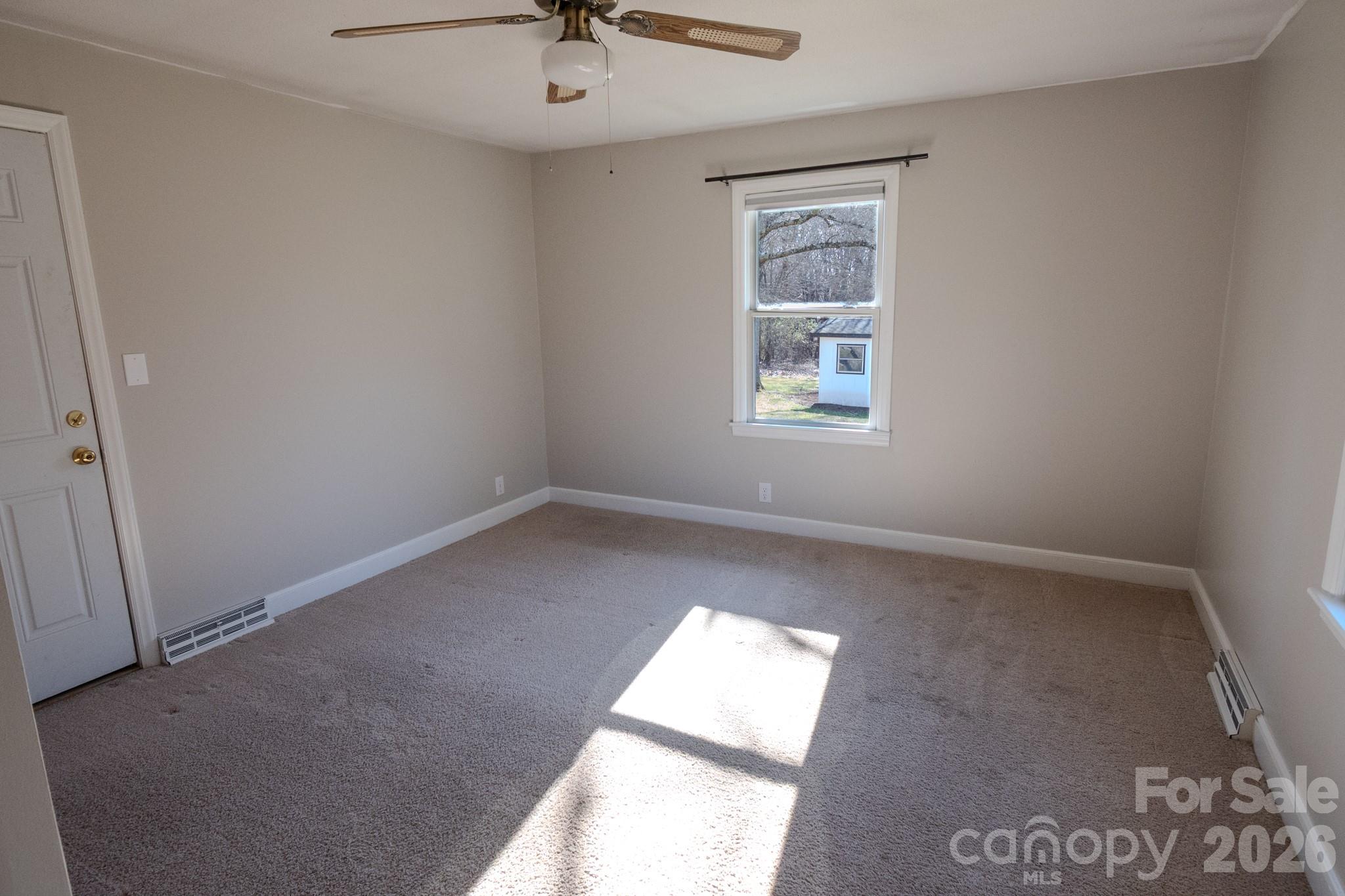 2113 Randolph Road Shelby, NC 28150 - Photo 19 of 39 an empty room with a window