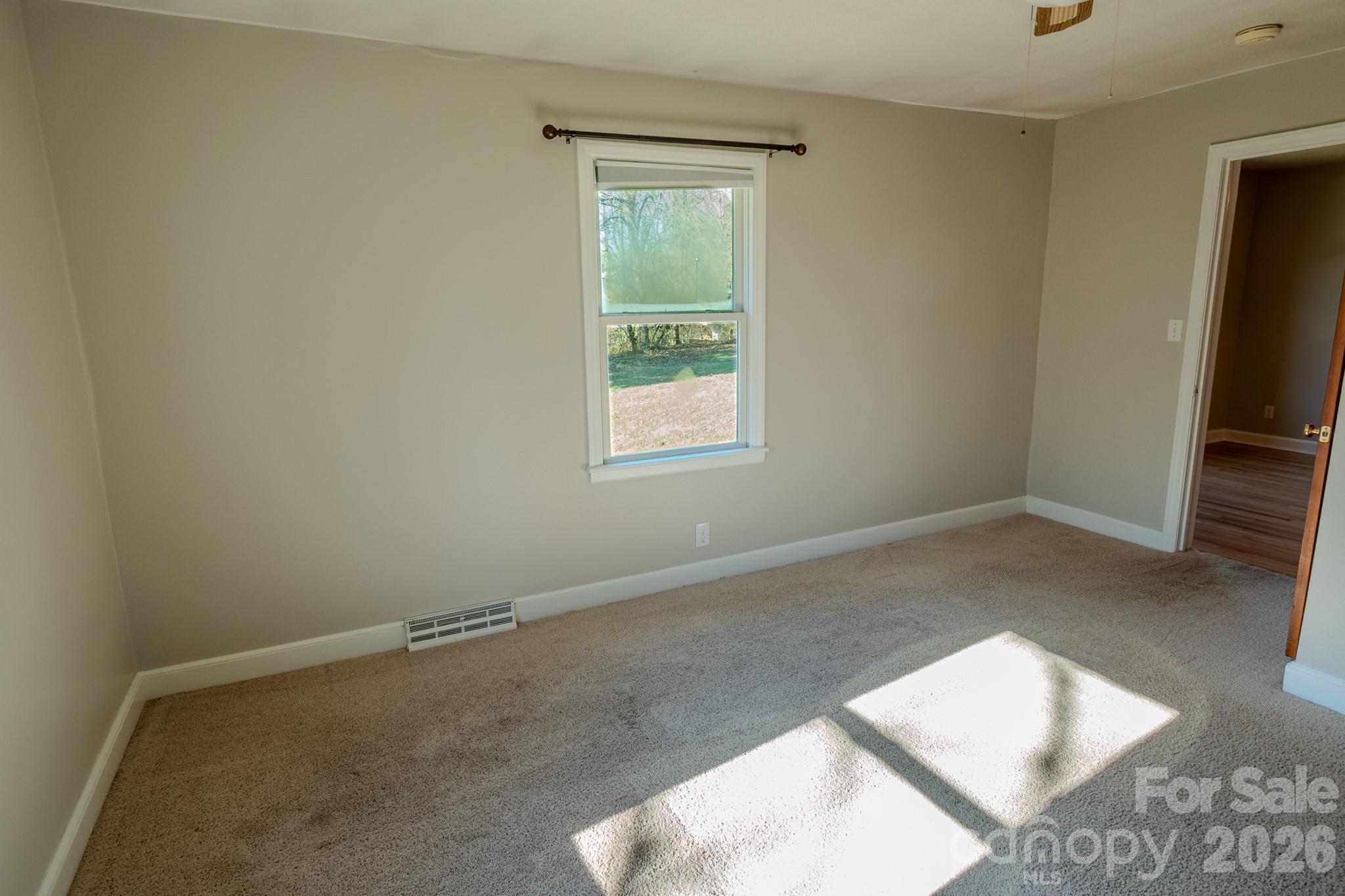 2113 Randolph Road Shelby, NC 28150 - Photo 20 of 39 an empty room with windows