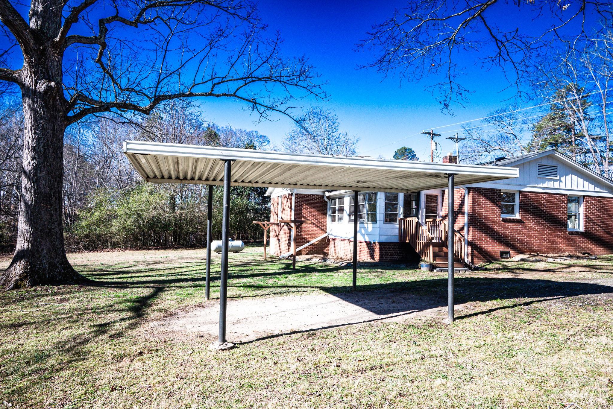 2113 Randolph Road Shelby, NC 28150 - Photo 28 of 39 a view of a house with a yard