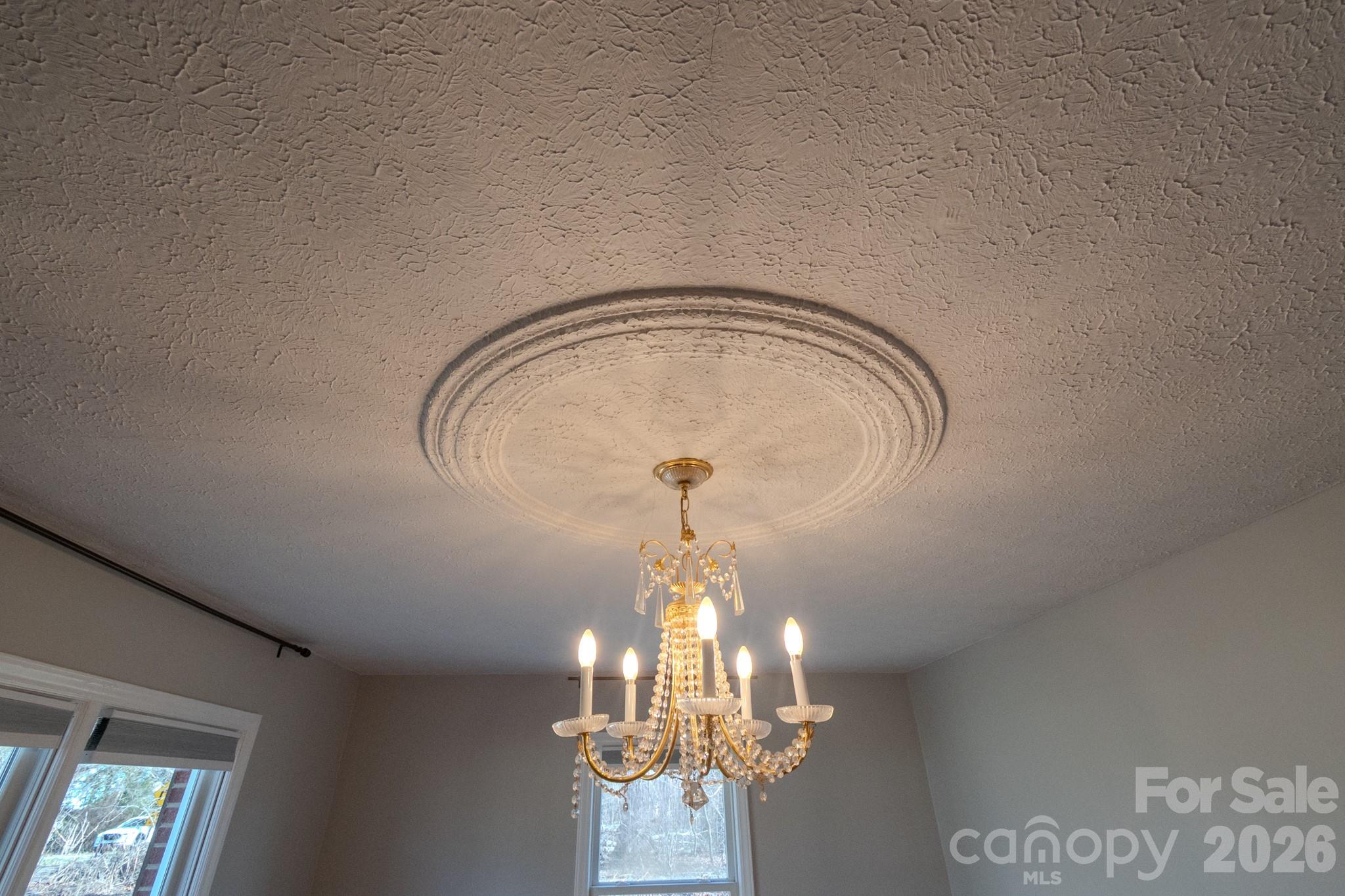 2113 Randolph Road Shelby, NC 28150 - Photo 5 of 39 a room with a chandelier