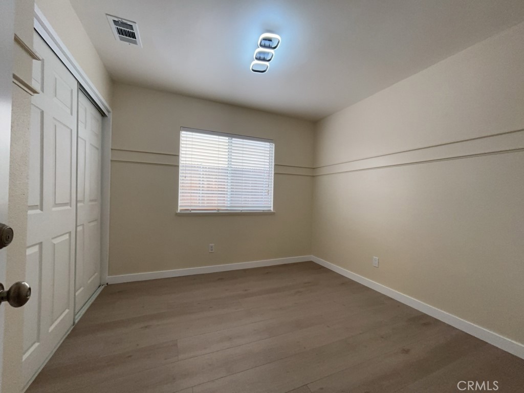 9263 Owari Lane Riverside, CA 92508 - Photo 10 of 17 an empty room with a empty space and windows
