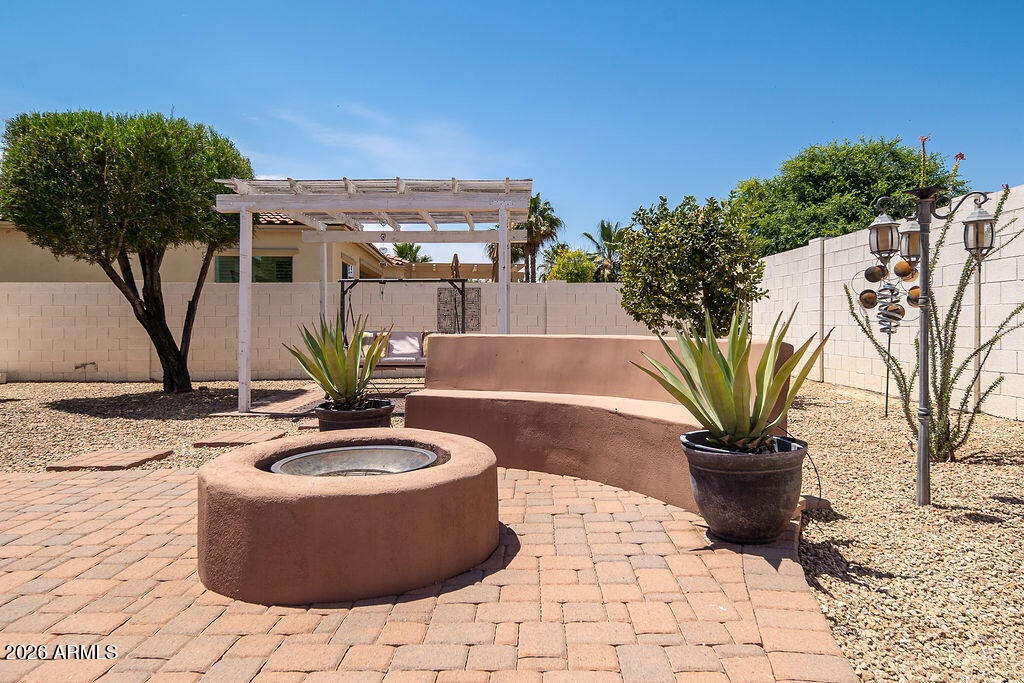 15730 West Harvard Street Goodyear, AZ 85395 - Photo 33 of 40 Firepit with Sitting Area
