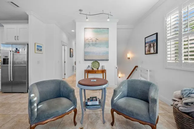 a bedroom with a bed window and furniture