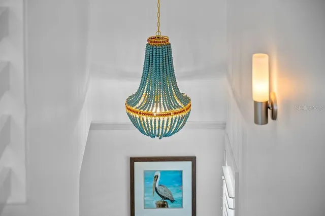 a view of a balcony with chair and table
