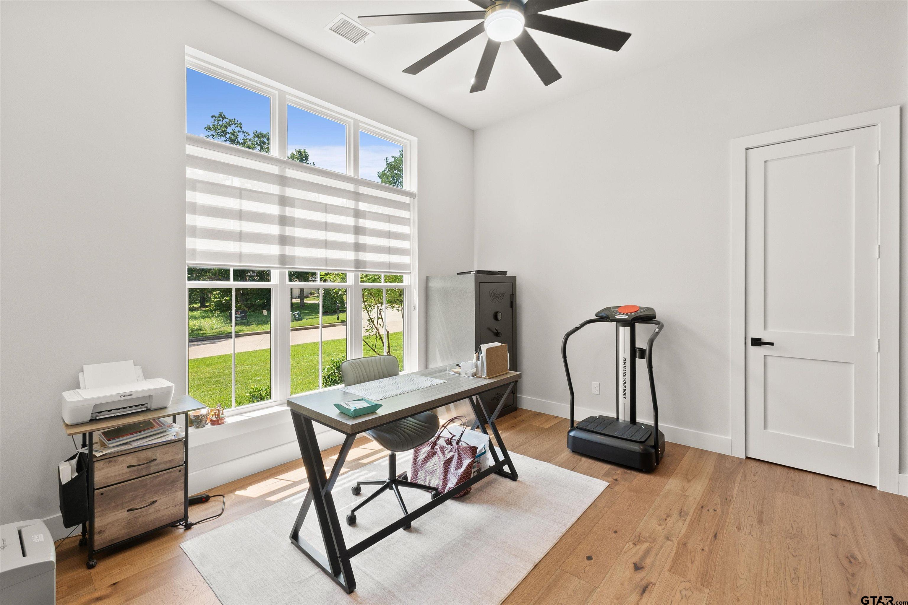 2895 Stewart Way Tyler, TX 75709 - Photo 15 of 44 a living room with furniture and a window