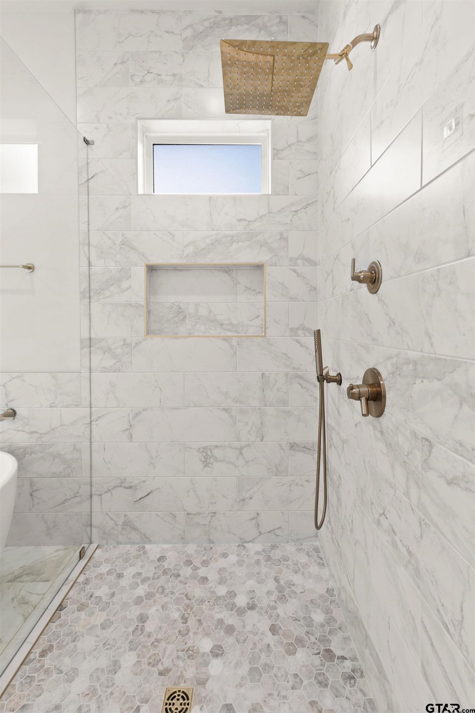 2895 Stewart Way Tyler, TX 75709 - Photo 35 of 44 a bathroom with a shower