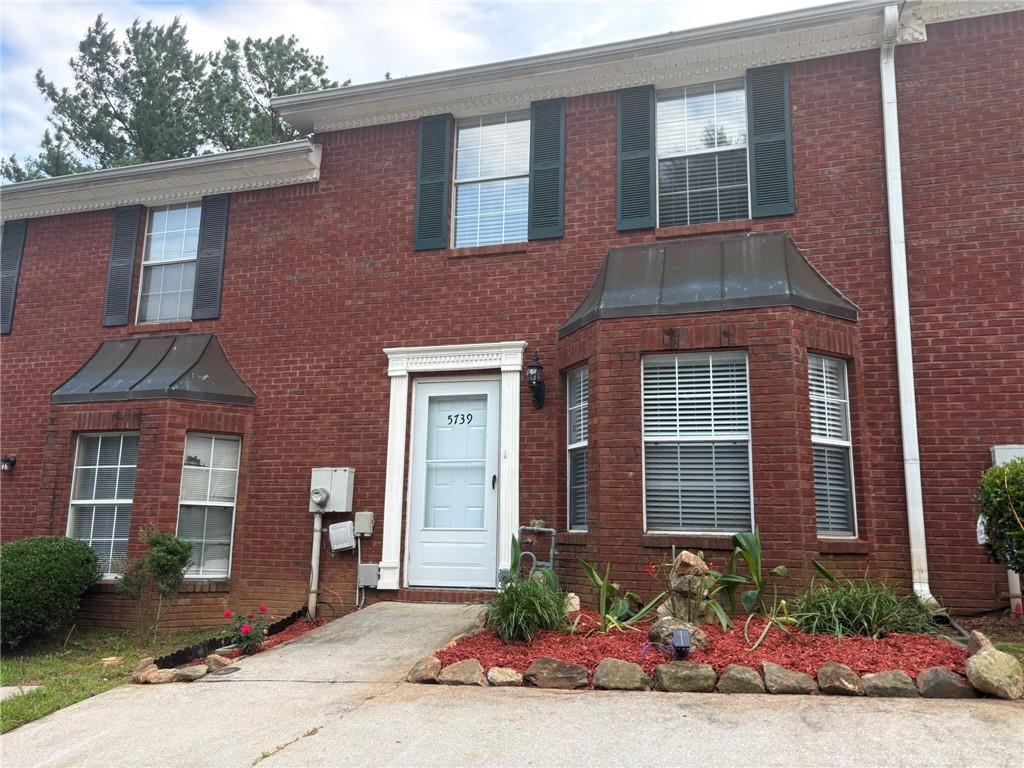 5739 Windfall Lane Lithonia, GA 30058 - Photo 2 of 36 a front view of a house