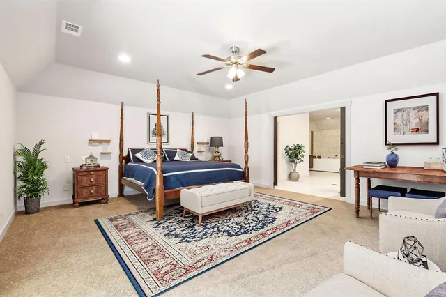 a living room with furniture and a rug