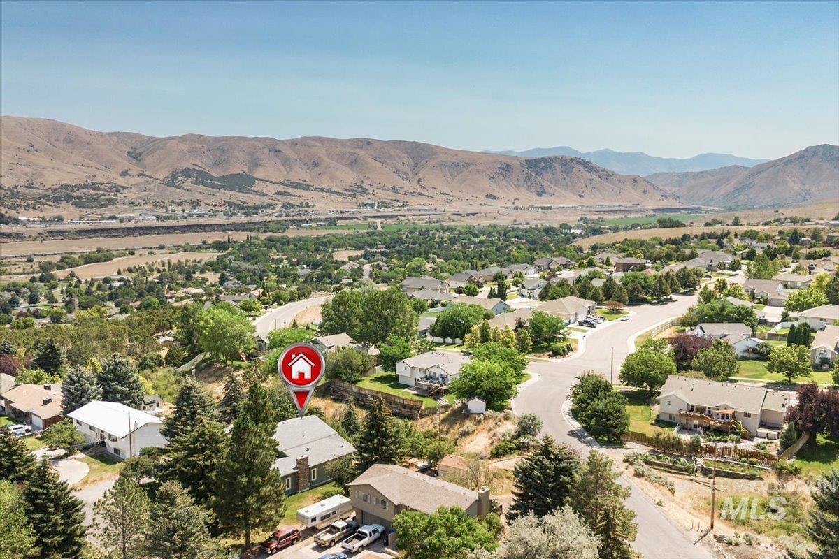 1401 Chokecherry Drive Pocatello, ID 83204 - Photo 44 of 46 Aerial perspective showcasing the residential neighborhood with mountainous terrain backdrop