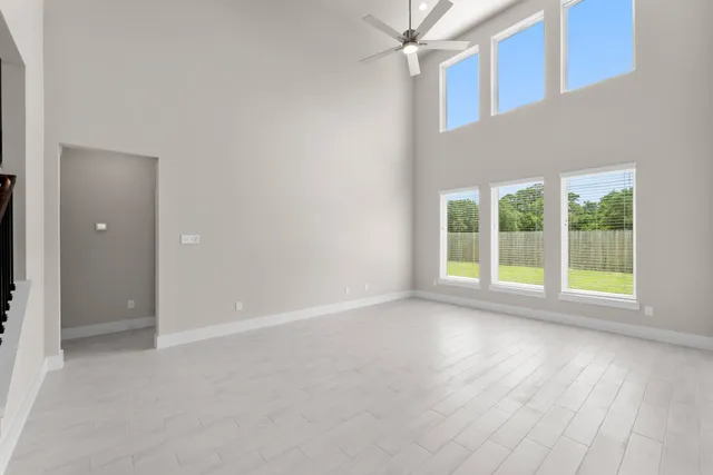 a view of room with window and hardwood floor