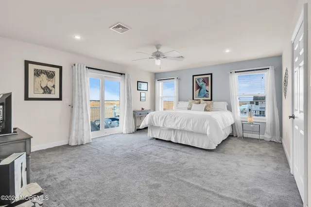 a bedroom with a bed and a walk in closet