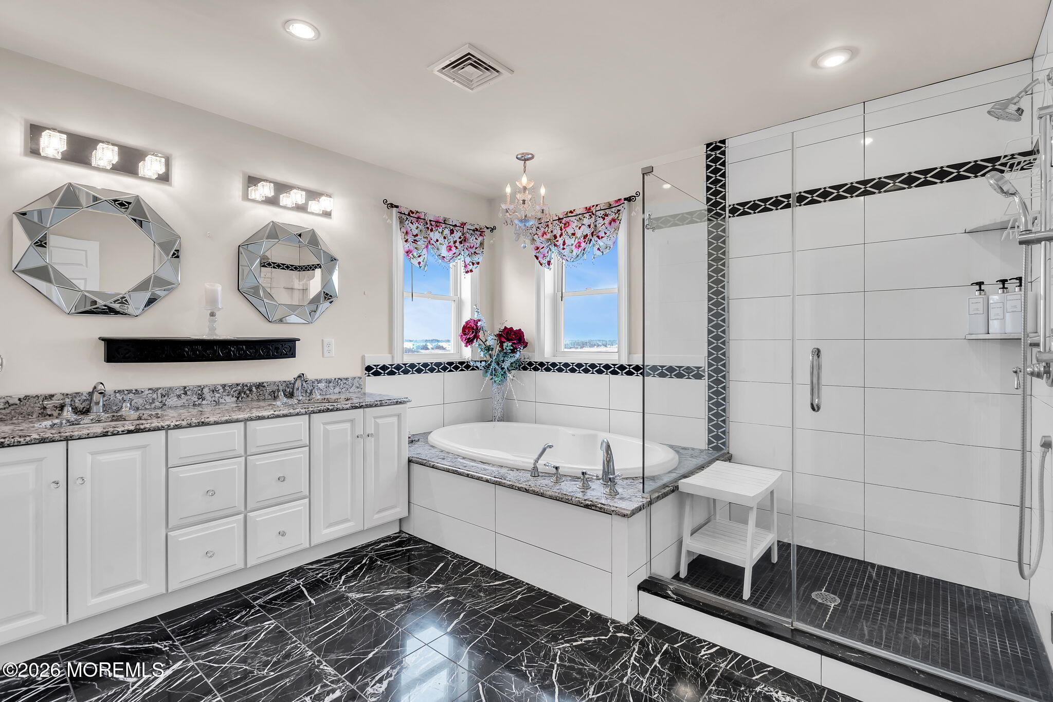 385 Kingfisher Road Tuckerton, NJ 08087 - Photo 27 of 58 a bathroom with a granite countertop sink a mirror and shower