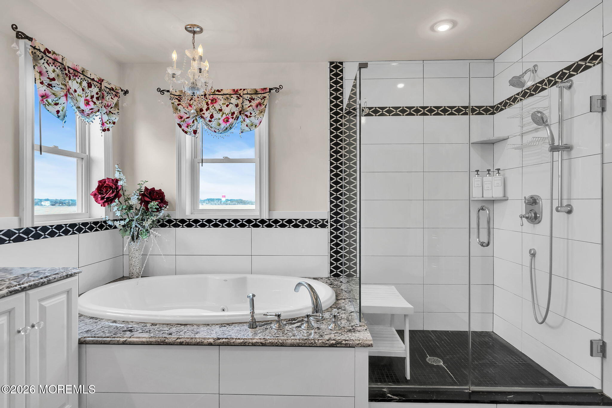 385 Kingfisher Road Tuckerton, NJ 08087 - Photo 28 of 58 a bathroom with a granite countertop sink a mirror and a shower