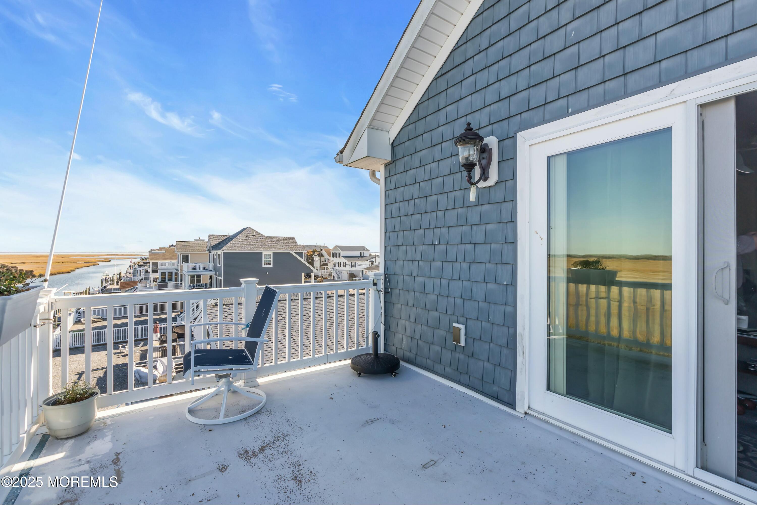 385 Kingfisher Road Tuckerton, NJ 08087 - Photo 30 of 58 a view of a terrace with chairs