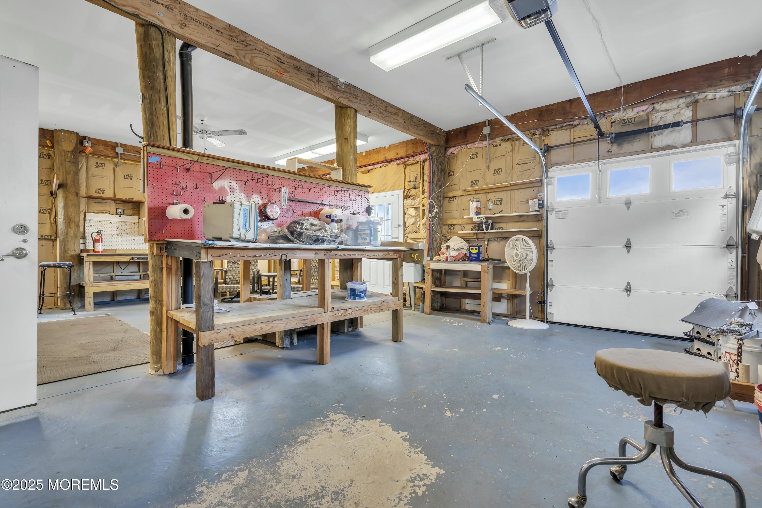 385 Kingfisher Road Tuckerton, NJ 08087 - Photo 41 of 58 a view of a room with racks on the wall