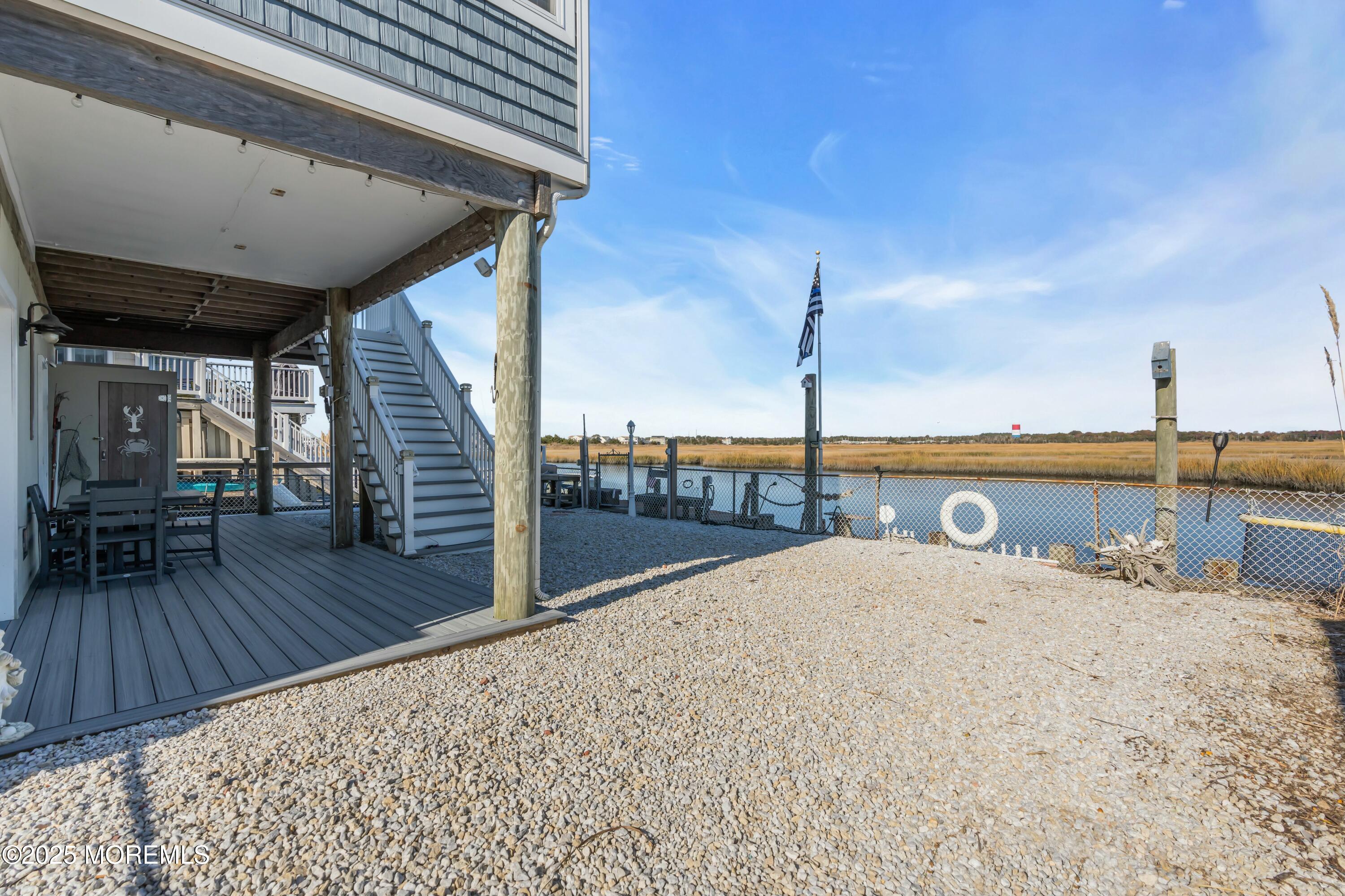 385 Kingfisher Road Tuckerton, NJ 08087 - Photo 44 of 58 a view of a terrace with wooden floor