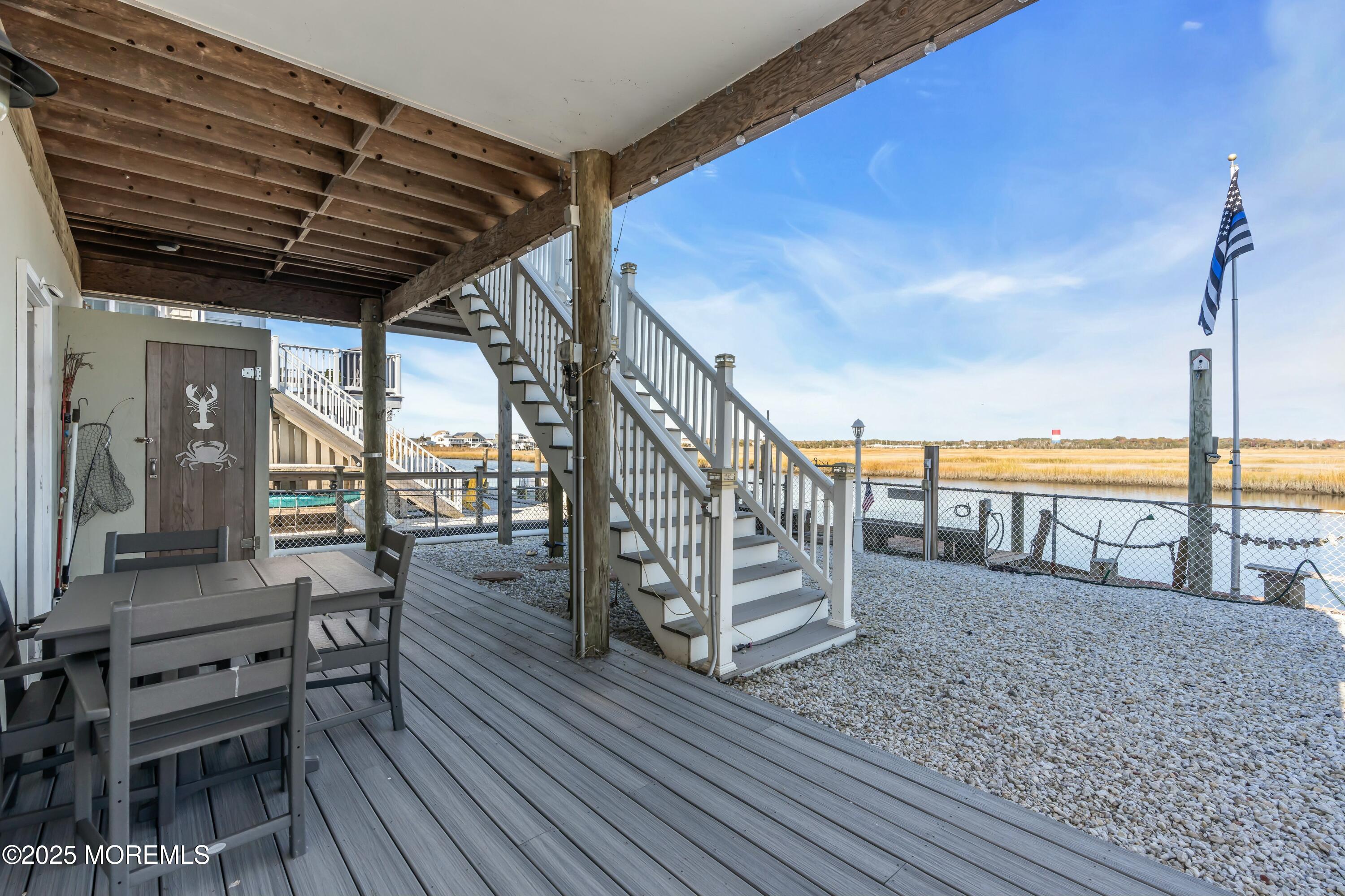 385 Kingfisher Road Tuckerton, NJ 08087 - Photo 49 of 58 a view of a balcony with chairs