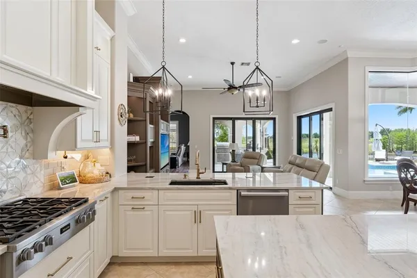 a bedroom with a bed next to a large window with the outer view