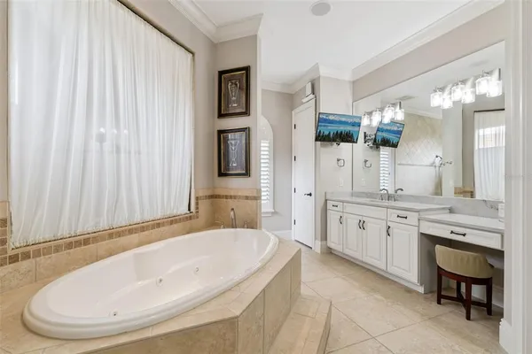 a bathroom with a shower a toilet and a sink