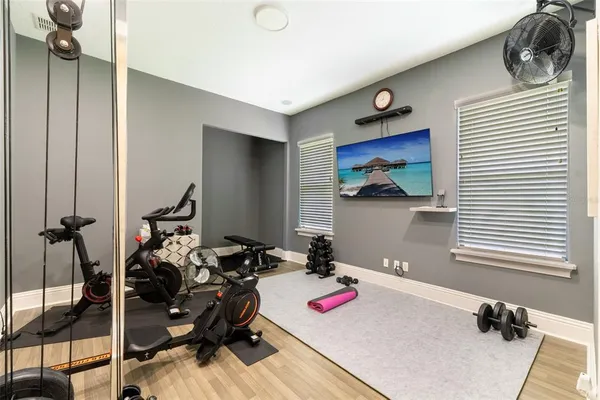 a view of a backyard with swimming pool