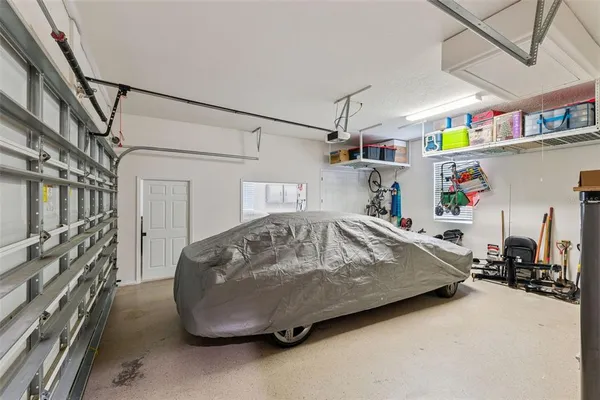 an aerial view of a house with a garden