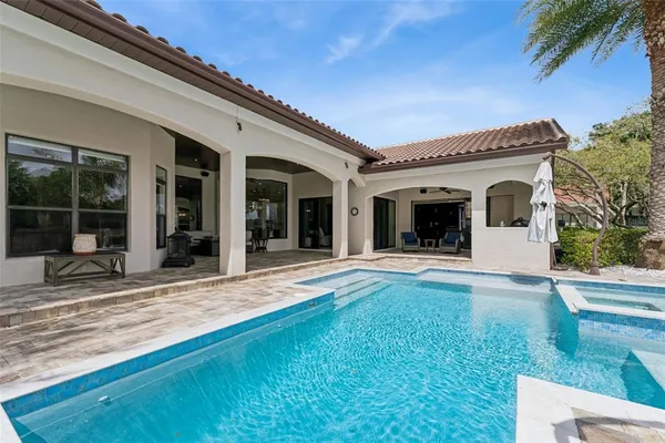 an aerial view of a house with a garden