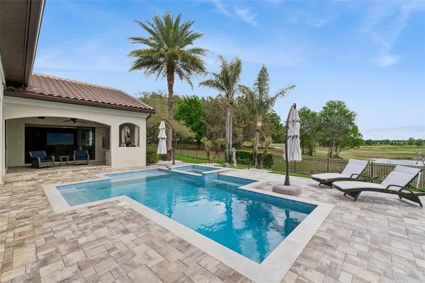 an aerial view of a house with a garden