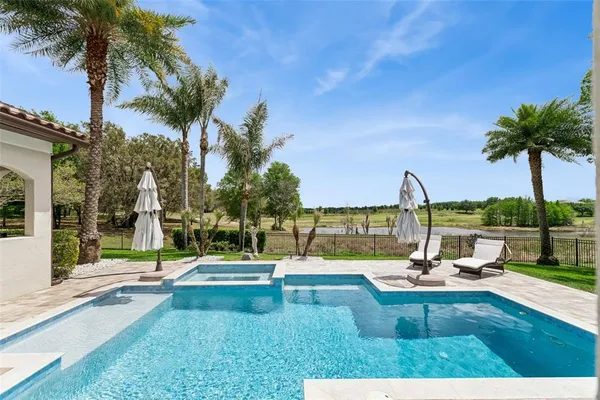 an aerial view of a house with a garden