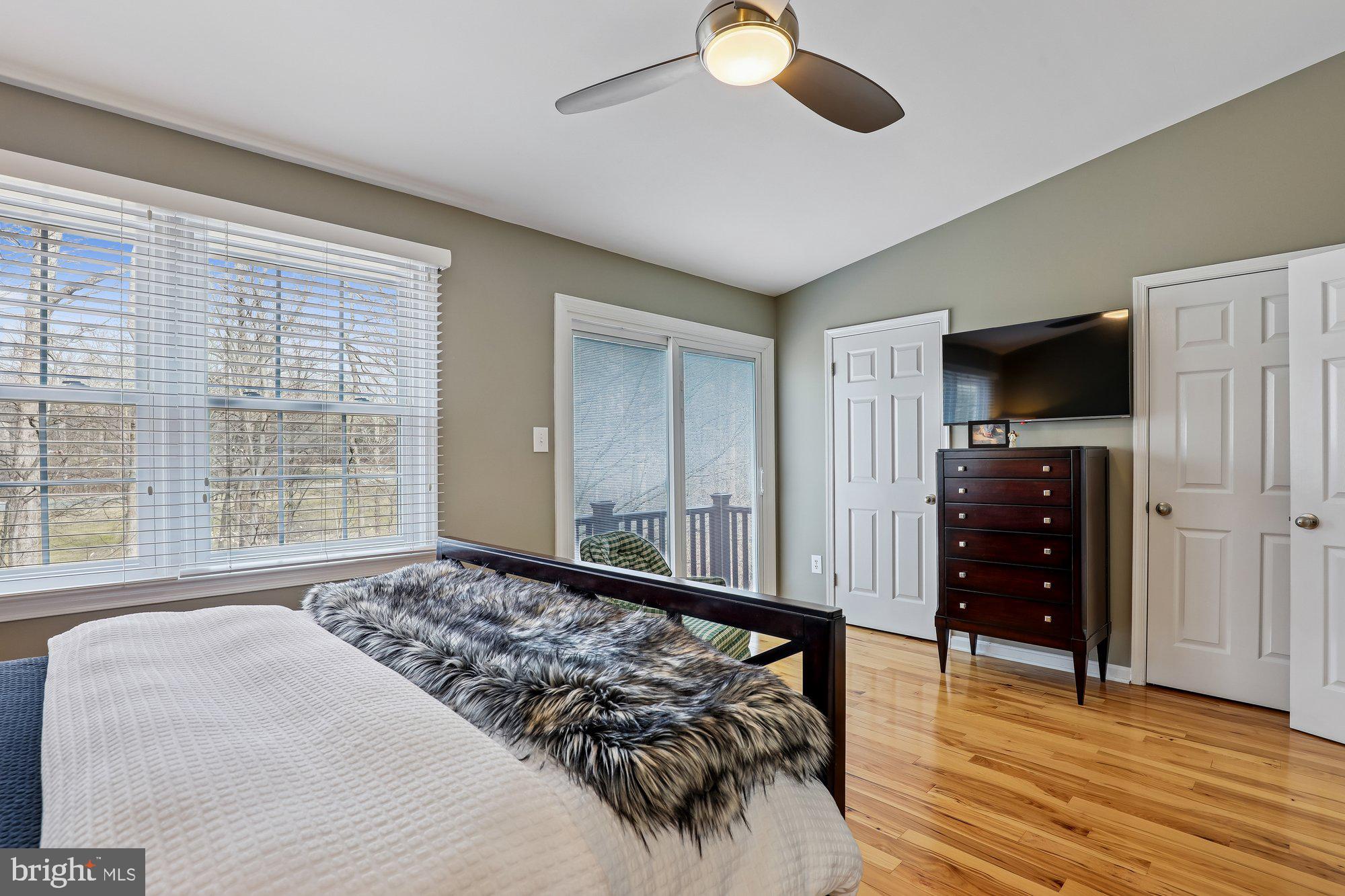 8019 Galla Knoll Circle Springfield, VA 22153 - Photo 25 of 57 a bedroom with a bed and a large window