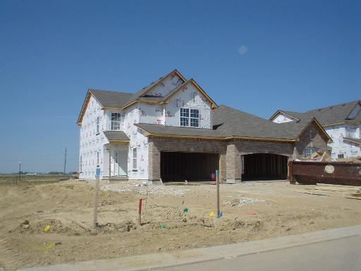 1144 Freedom Road, Unit B1 Elburn, IL 60119 - Photo 1 of 1 a view of a house with a yard