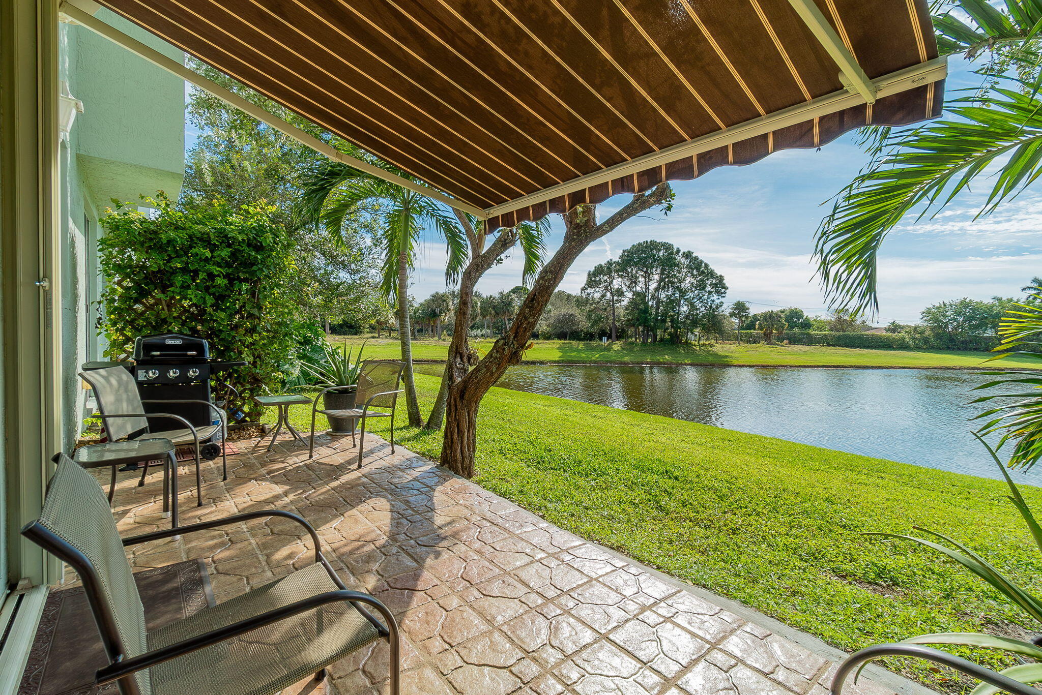 3165 Laurel Ridge Circle Riviera Beach, FL 33404 - Photo 26 of 32 Back patio