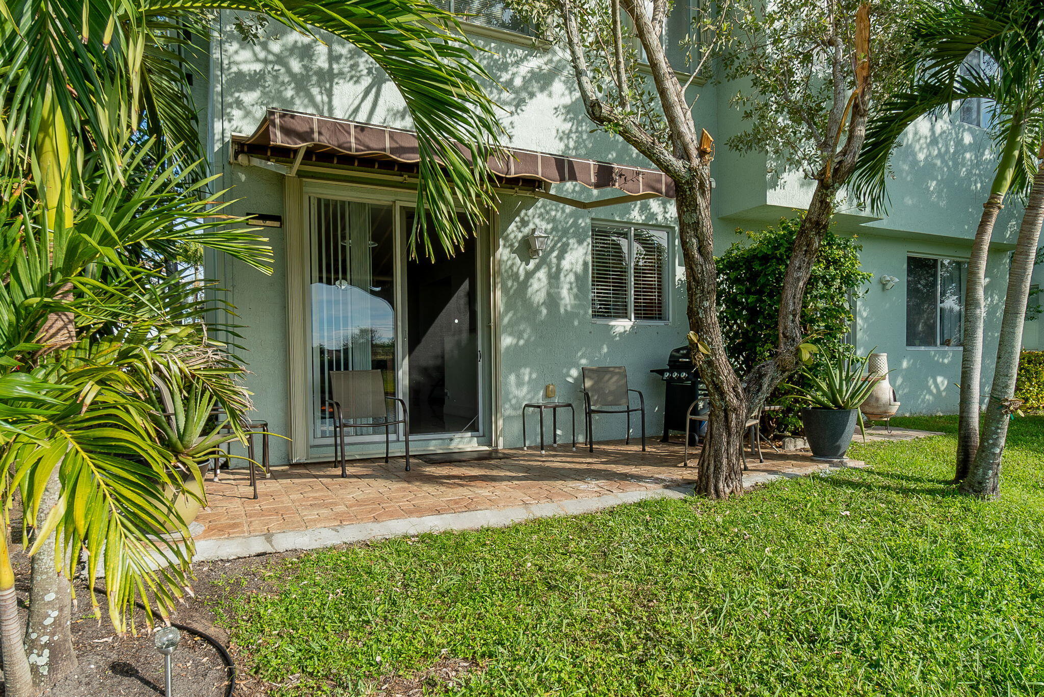 3165 Laurel Ridge Circle Riviera Beach, FL 33404 - Photo 28 of 32 Back patio