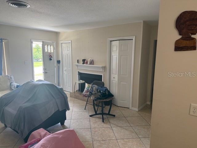 2108 Wolf Road Orlando, FL 32808 - Photo 3 of 14 a living room with furniture and a window