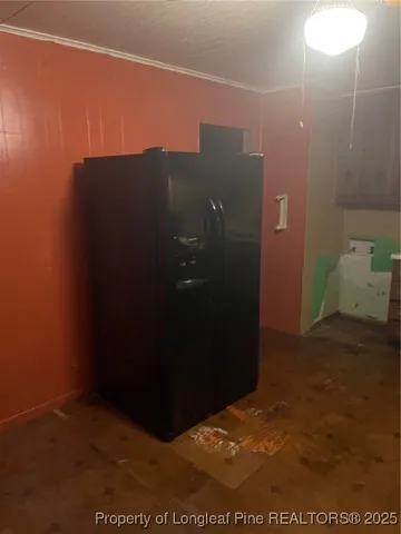 a white toilet sitting next to a bathroom sink and a mirror