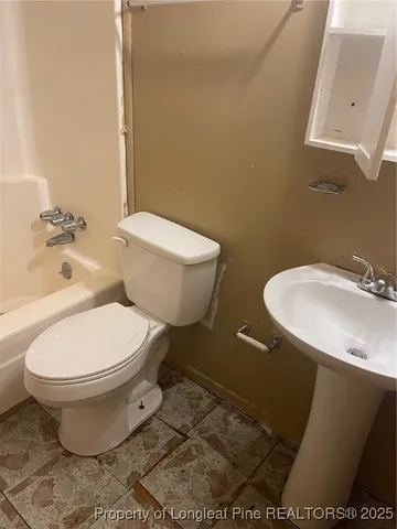 a view of backyard with green space