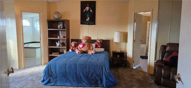 a bathroom with a sink a mirror and a vanity