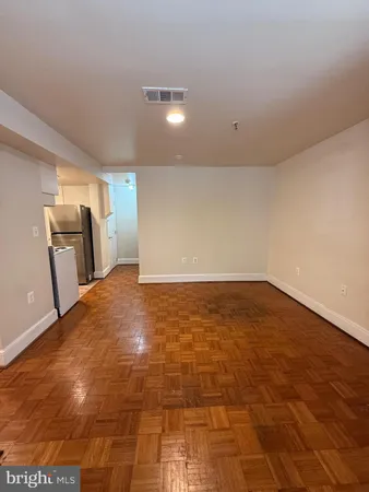 a kitchen with a stove and a sink