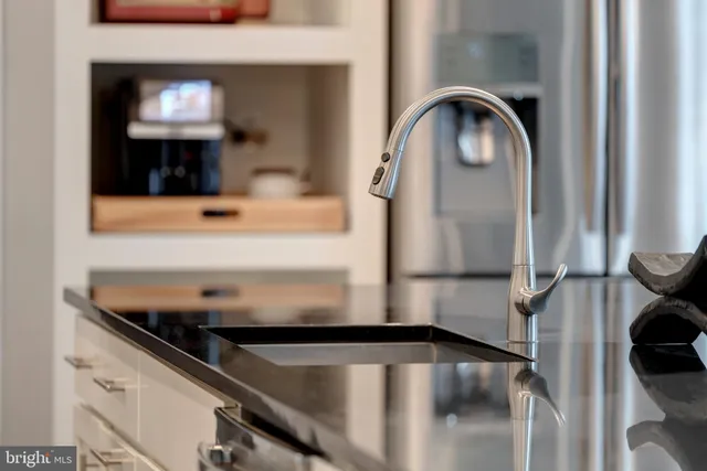 a view of staircase with a flat screen tv