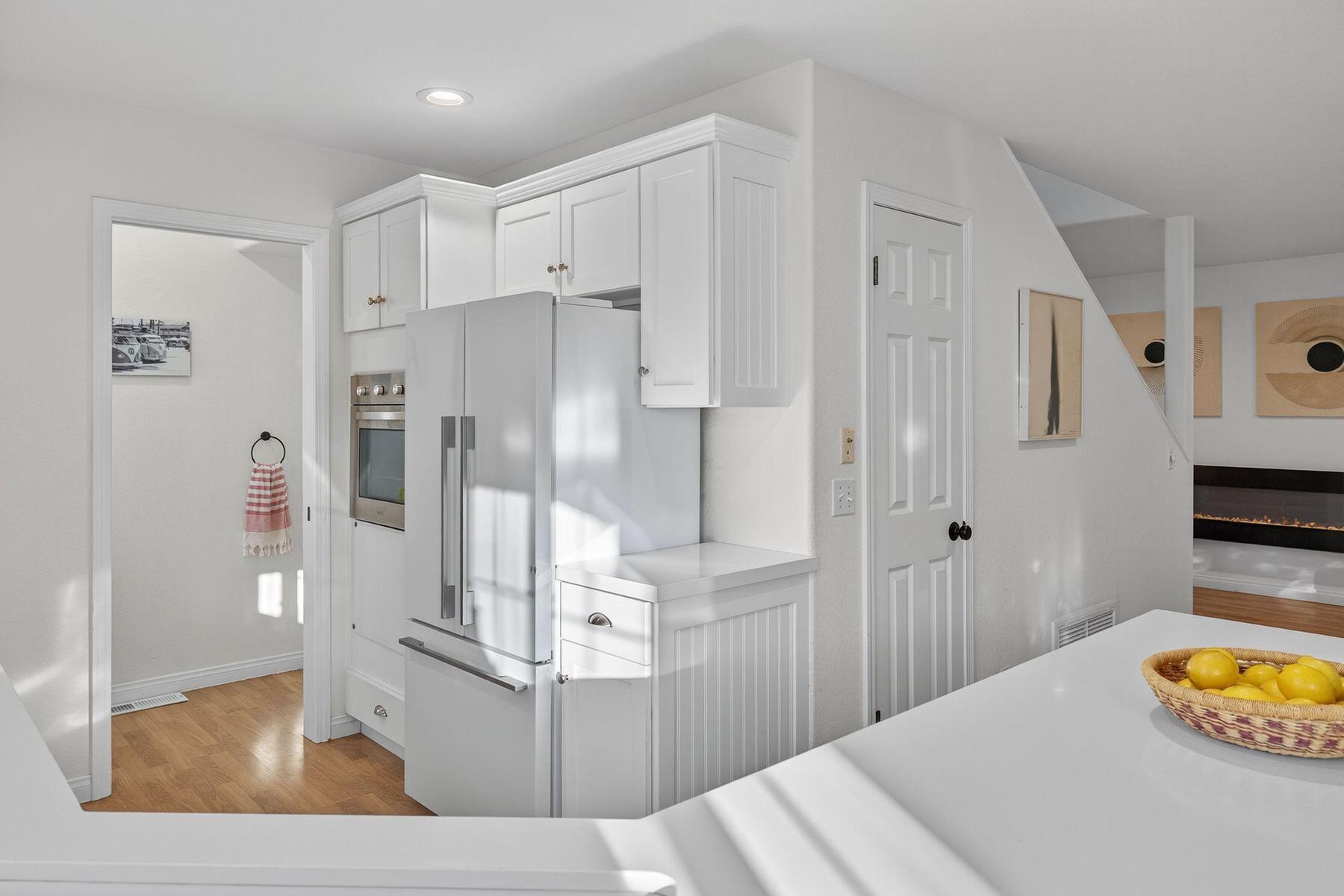 4731 4th Street Carpinteria, CA 93013 - Photo 9 of 30 a view of kitchen with stainless steel appliances kitchen island refrigerator and stove