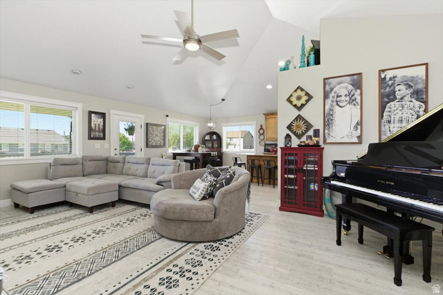 772 East 600 South Preston, ID 83263 - Photo 6 of 35 Vaulted ceilings featuring a modern ceiling fan, wood-finish flooring, and multiple windows